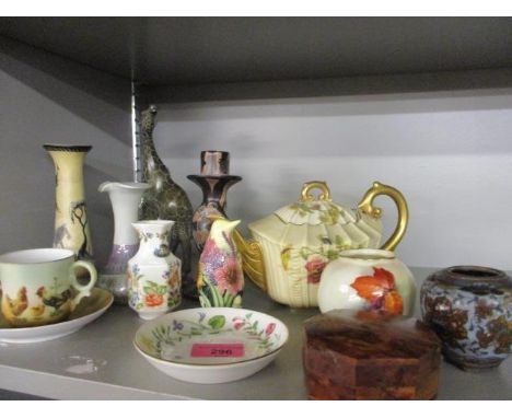 A Royal Worcester floral and gilt teapot, a Worcester pot, a cloisonne pot A/F, an Old Tipton ware model of a penguin and mix