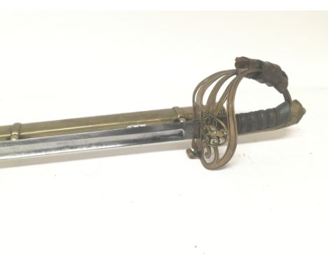 A Victorian 1845 pattern officers sword the brass hilt with Queen Victoria cypher maker Henry Wilkinson Pall Mall London with