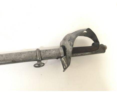 A I world war Cavalry sword with a wooden grip the guard stamped 133.steel scabbard total length 109cm