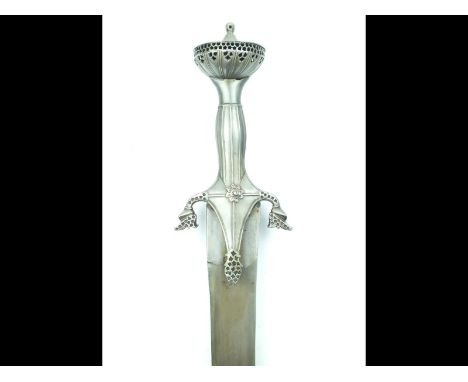 An 18th Century Pulwar fitted with a Wootz steel blade, 83cm curved blade with clipped back point and displaying a fine close