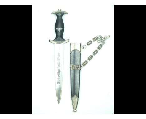 An SS Officer's chained dagger, 21.7cm flattened diamond section blade etched with the motto Meine Ehre Heist Treue, regulati