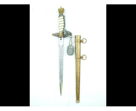 A Third Reich Kriegsmarine Officer's dagger, 25cm double fullered blade by Alcoso, Solingen, regulation gilt brass hilt with 