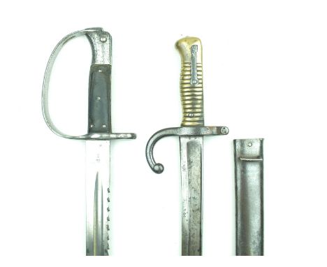 A 1897 Pattern Artillery bayonet, 65cm saw backed blade with various ordnance and date stamps, together with a Chassepot bayo