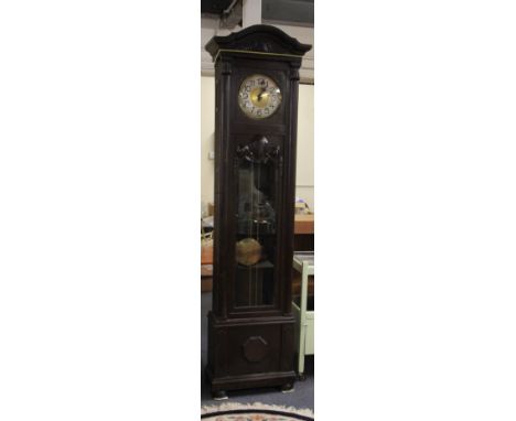 A large early 20th century oak cased longcase clock. H. 225 cm.