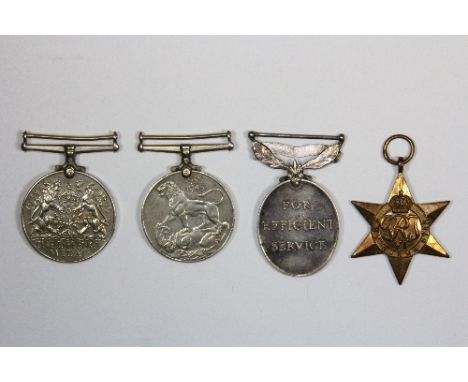 Four mixed military medals including Territorial Army for 702179 Sgt. G. Parkin Royal Signals and a Burma Star.