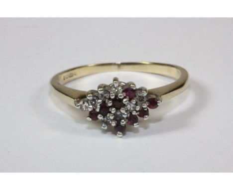 A 9ct gold ruby and diamond ring (N)
