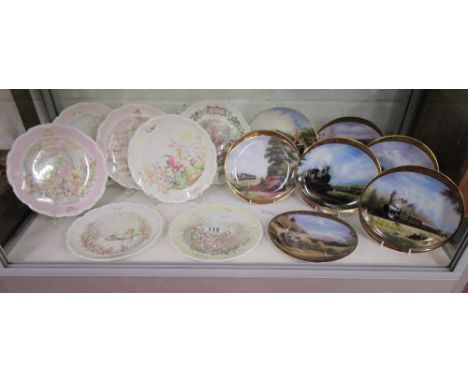 Shelf of commemorative plates to include Royal Doulton