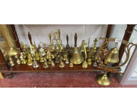 Shelf of mostly brass bells