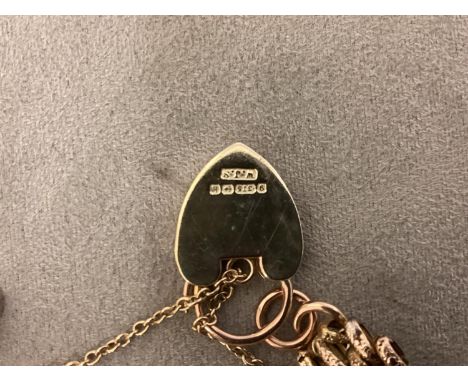 A 9ct gold gate link bracelet with gold heart locket 17.5g 