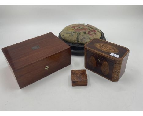 An inlaid tea caddy, with two sections and internal lids, and a smaller burr box, and a mahogany box, and a circular tapestry