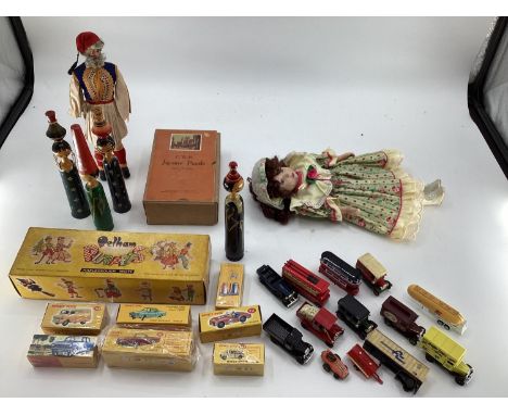 A collection of seven boxed Dinky Toys together with a C20th toys to include Pelham Puppet 