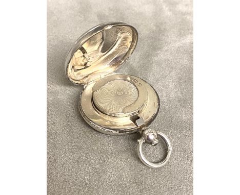 A Sterling silver circular sovereign case, Birmingham by Aaron Lufkin Dennison 1905, 30g 
