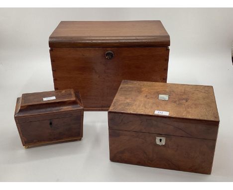 A Victorian travelling dressing set fitted interior with white metal topped glass items and secret drawer, together with a bu