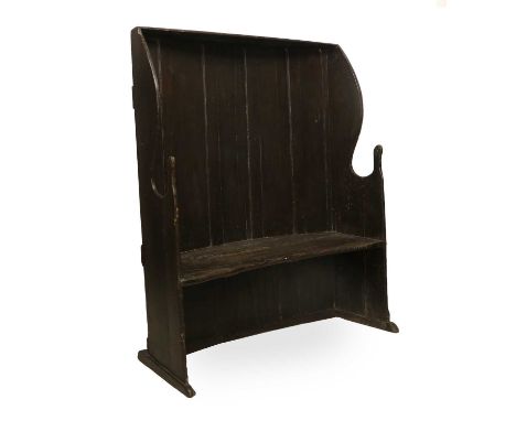 A George III Elm-Seated and Pine Wing-Back Settle, 3rd quarter 18th century, the tall plank back support above scrolled shape