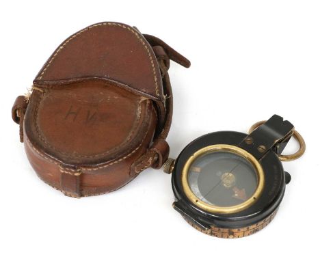 A First World War Marching Compass, makers T. Cooke & Son, No. 41282, 1916, in ebonized brass case and with mother of pearl d