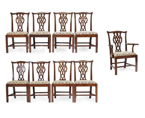 A Set of Nine (8+1) George III Chippendale-Style Provincial Dining Chairs, late 18th century, with later floral upholstered d