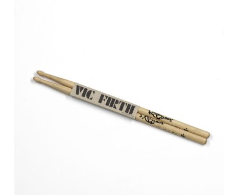 The Rolling StonesA Pair of Vic Firth Drumsticks Signed By Charlie WattsMade in the USA, each stick is signed by drummer Char