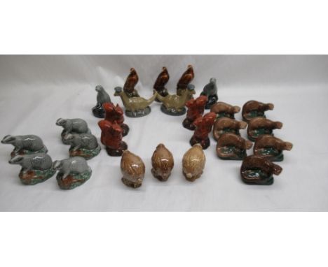 Twenty six Beswick, Whyte &amp; Mackay scotch whiskey animal miniatures, including badgers, squirrels, eagles, seals, stouts 