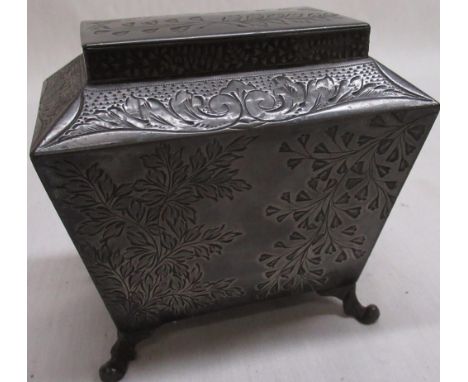Mid Victorian tea caddy of sarcophagus design, cast decoration of foliage and scrolling acanthus leaves, raised on cabriole f