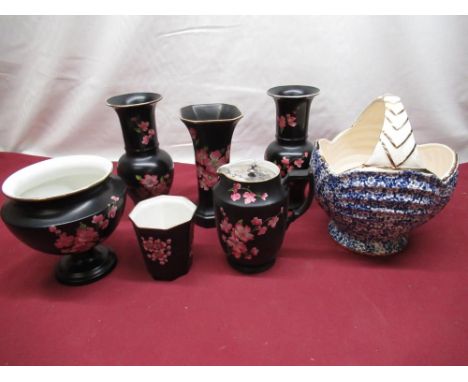 Six pieces of black Carlton Ware with apple blossom design including vases, water jug etc, an Arthur Wood ceramic blue and wh