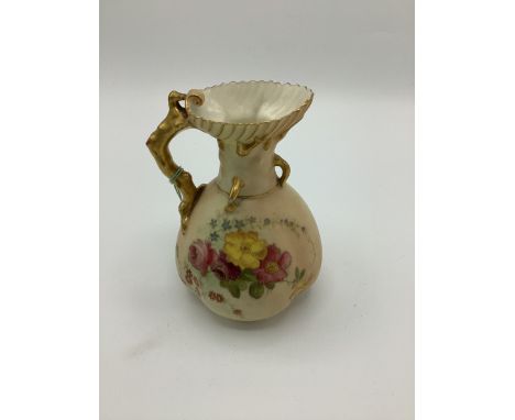 Early C20th Royal Worcester jug, coral handle and blush ivory ground decorated with floral sprays green back stamp with Rd.No