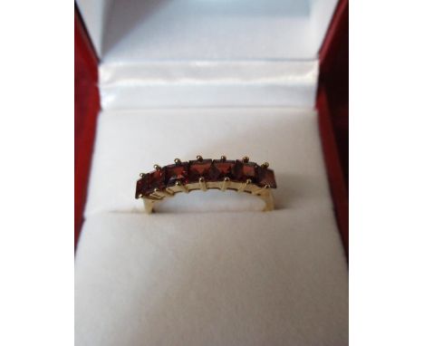 Teenage Cancer Trust Fundraiser - 9ct gold and seven stone ruby ring 