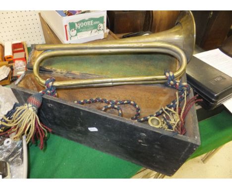 A Victorian brass bugle by Boosey & Co. (No. 33772), in purpose built wooden case