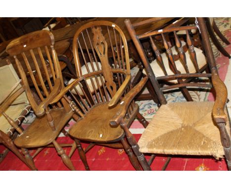 A Victorian Thames Valley beech and elm stick back elbow chair with shield fretwork carved back splat, together with a 19th C