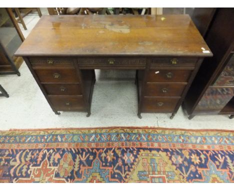 A Victorian walnut double pedestal desk