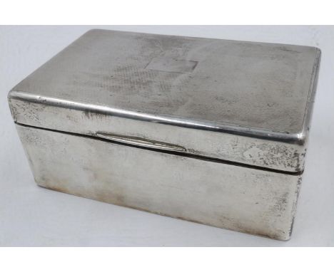 Engine turned silver cigarette box, 14 x 8 x 6 cm, hallmarks rubbed, cedar lined, 441g. UK P&amp;P Group 1 (£16+VAT for the f