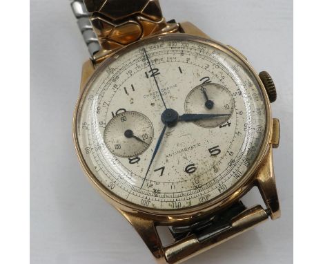 CHRONOGRAPH SUISSE: 18ct gold cased gents wristwatch on a gold plated expanding bracelet with second and date dials, not work