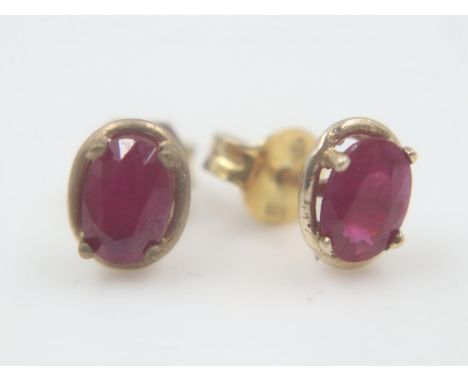 Pair of silver gilt ruby-set studs. UK P&amp;P Group 0 (£6+VAT for the first lot and £1+VAT for subsequent lots) 