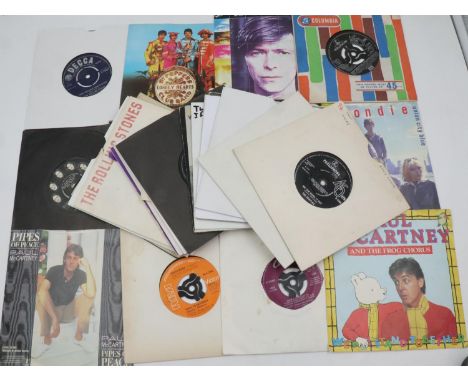 Thirty mixed singles including The Beatles, The Rolling Stones and David Bowie. UK P&amp;P Group 3 (£30+VAT for the first lot