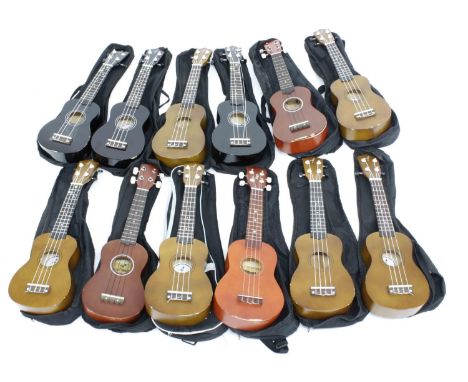 Twelve contemporary ex-student played ukuleles in variable condition, all in soft bags (12) *This lot is subject to 20" VAT o