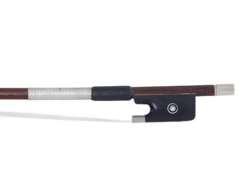 French nickel mounted violin bow by and stamped Vtor Fetique á Paris, the stick round, the ebony frog inlaid with nickel ring