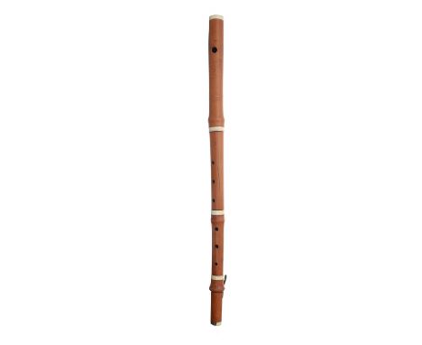 Boxwood flute by and stamped R. Mould, London with single square brass key, sound length 54cm, overall length 60.5cm