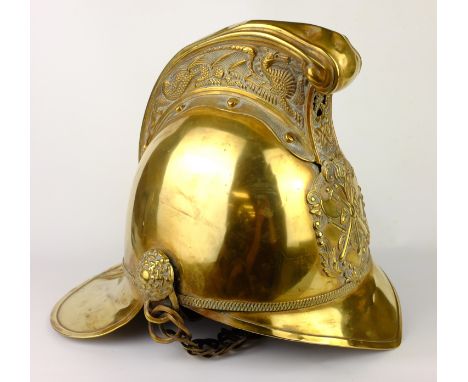 19th century Merryweather pattern brass fire helmet, with National Fire Brigade Association badge, adjustable leather liner w