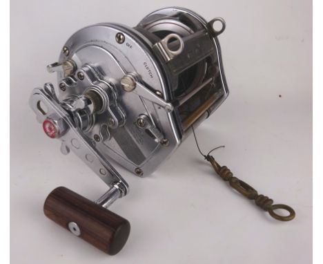Daiwa Special Model Heavy-Duty Ocean fishing reel, chromed body with wooden handle, W21.5cm max   Condition Report   Click he