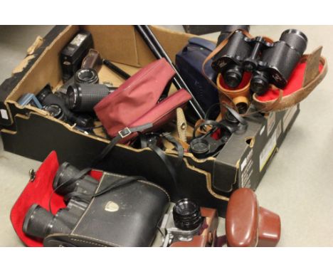 A box containing three pairs of binoculars; vintage cameras including Polaroid Instant and Olympus SLRs etc