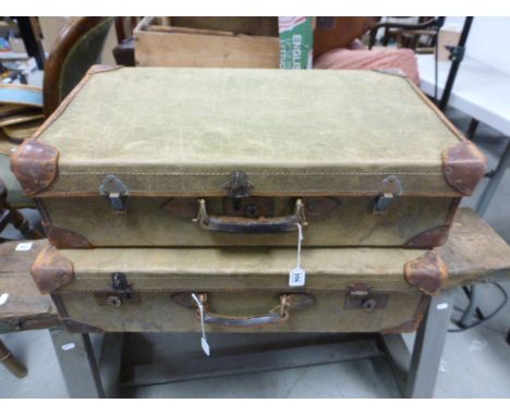 Two vintage canvas suitcases
