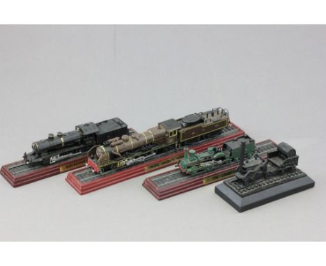 A group of four scale model locomotives to include Stephenson's Rocket