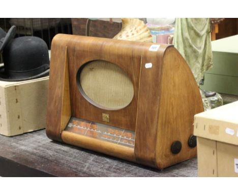 A walnut cased vintage HMV (His Masters Voice)  radio; latterly converted to electricity