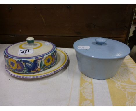 A Poole Pottery butter dish and cover; in the Bluebird pattern; together with a Copeland Spode dish and cover deocrated with 