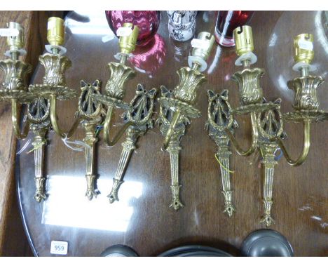 A set of six single branch hanging light fittings; converted for electricity