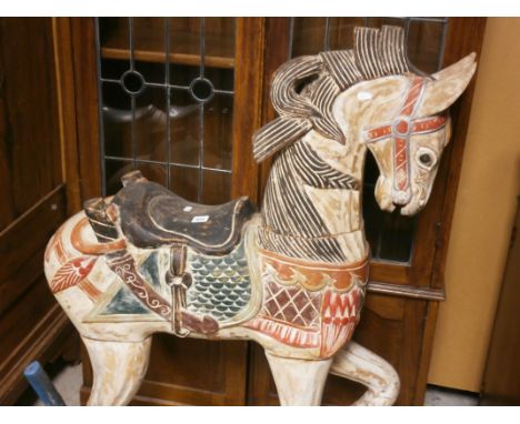 A possibly Continental painted  carved wooden model of a standing horse
