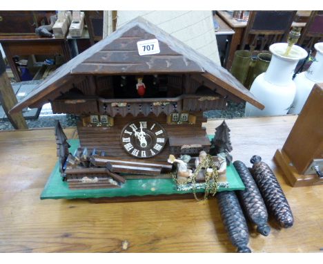 A mid 20th century Cuckoo clock complete with weights