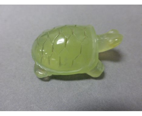 A possibly jade green hardstone model of a tortoise