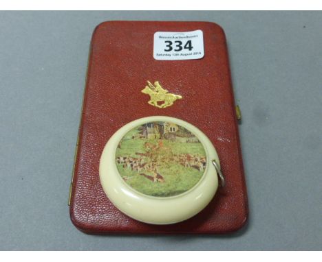 Early 20th century Red Leather Cigarette Case with Horse & Huntsman Design together with a Vintage Dean's Sewing Tape Measure