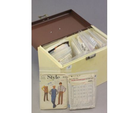 Collection of vintage unused knitting patterns in retro box