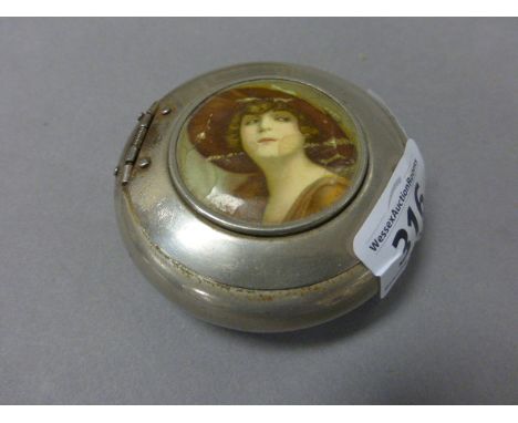A 1920s/30s snuff box with central panel decorated with lady in hat